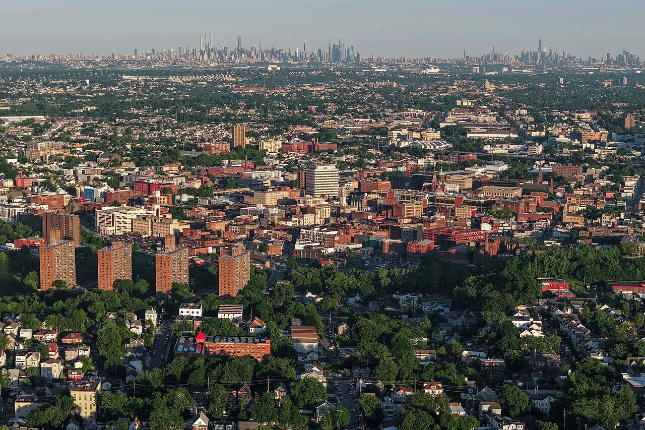 Downtown Paterson in 2026, with Manhattan visible in the background